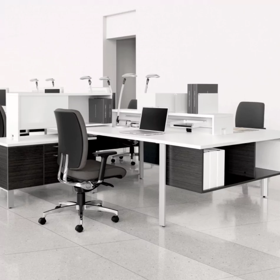 Modern office workspace featuring the 'Benching 4' desk design with ergonomic chair, laptop, and organized storage solutions, emphasizing productivity and style.