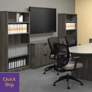 Conference room featuring laminate bookcase storage, organized files, and modern office chairs, with a "Quick Ship" label in the corner.
