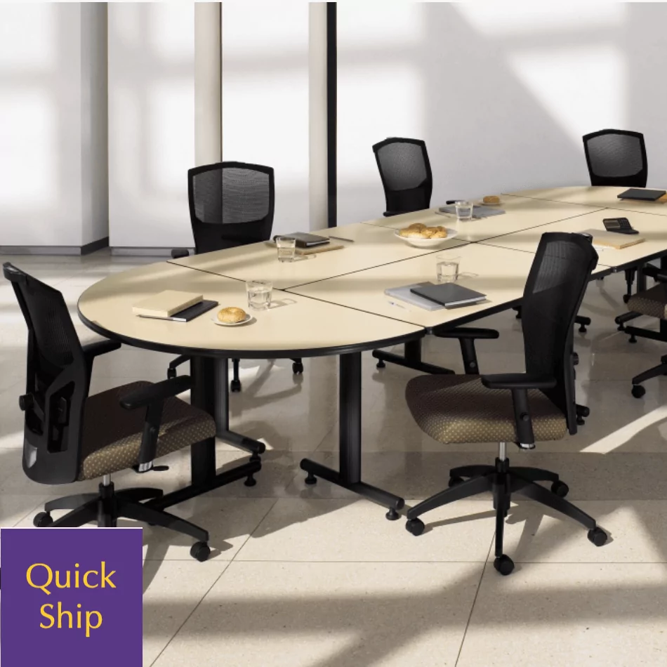 Training table setup with T-legs, surrounded by black mesh chairs, featuring notebooks and refreshments, labeled "Quick Ship."