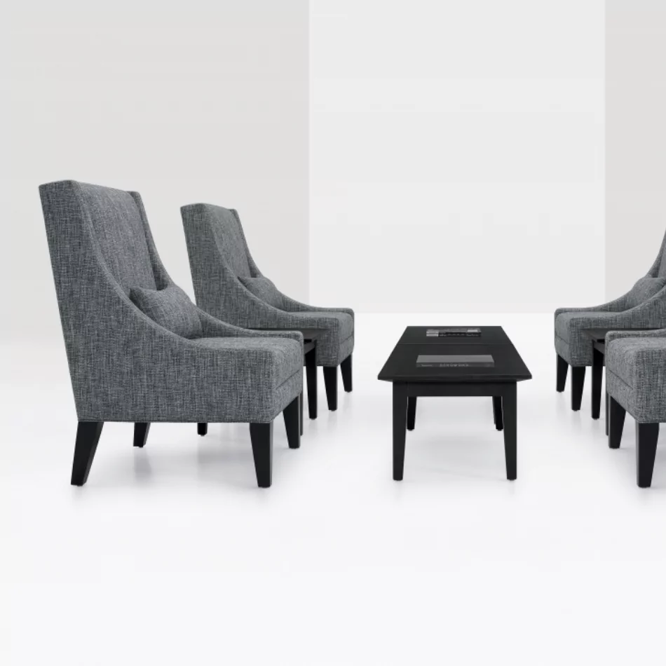 Vitrola Lounge collaborative seating arrangement featuring two high-backed gray chairs and a black coffee table, designed for reception areas.