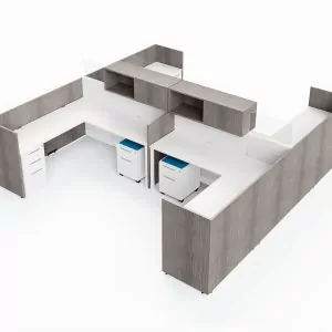Cubicle design featuring the Global Evolve 4 workspace layout, showcasing modern gray finishes, white surfaces, and integrated storage solutions.